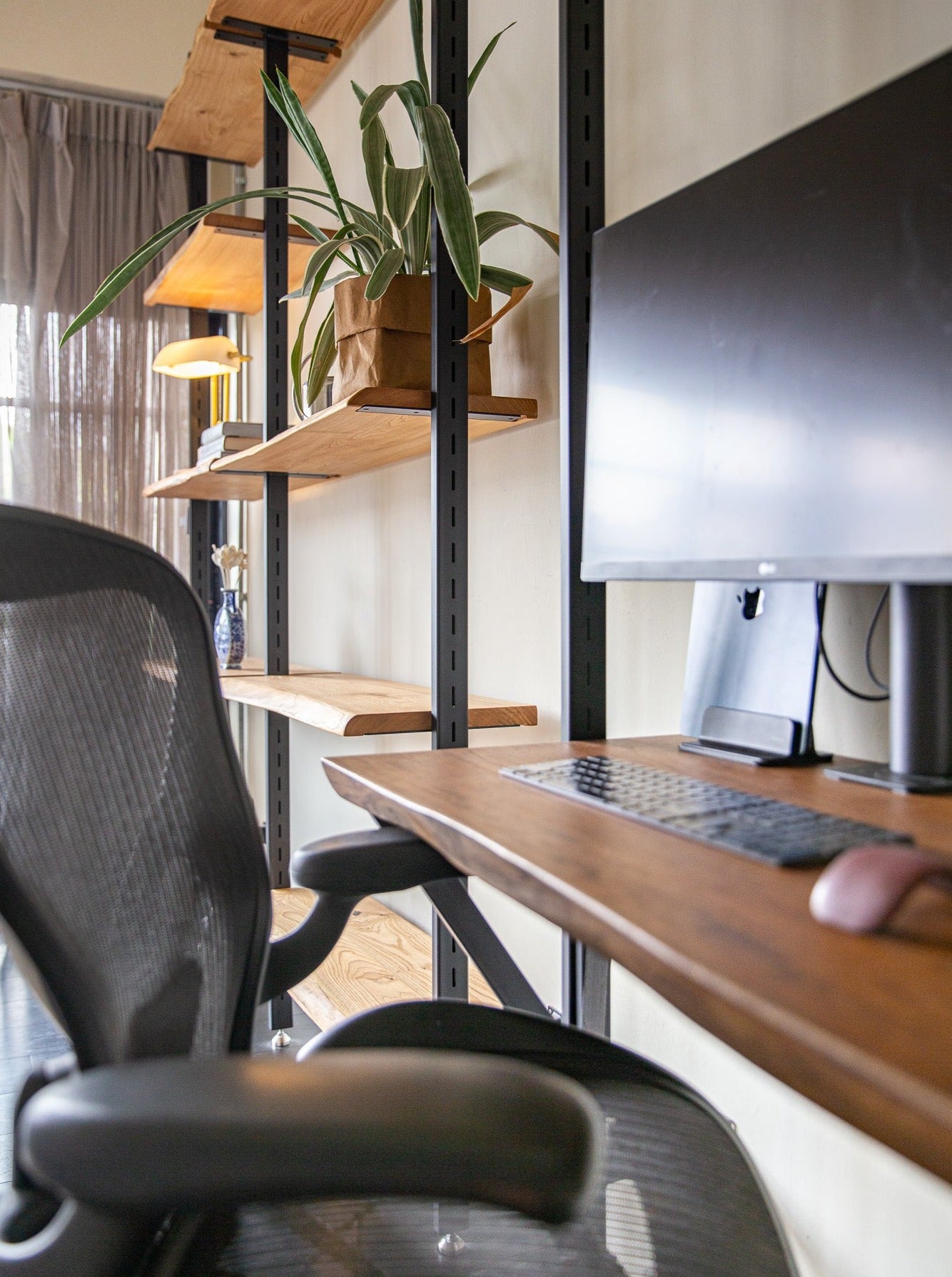 Closeup of Atlas Shelving System with Desk Extension by The Table Guy
